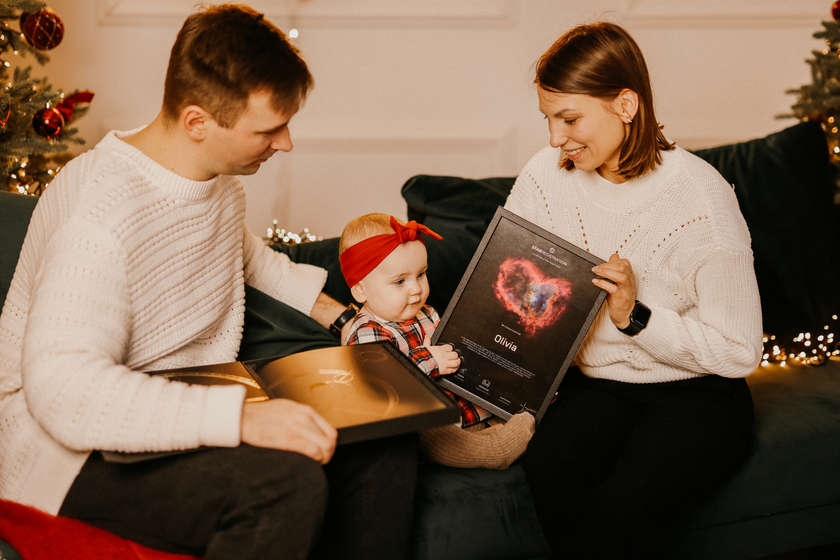 Parents gifting a star to their child