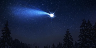 A comet falling in the night sky