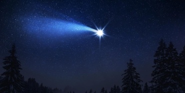 A comet falling in the night sky