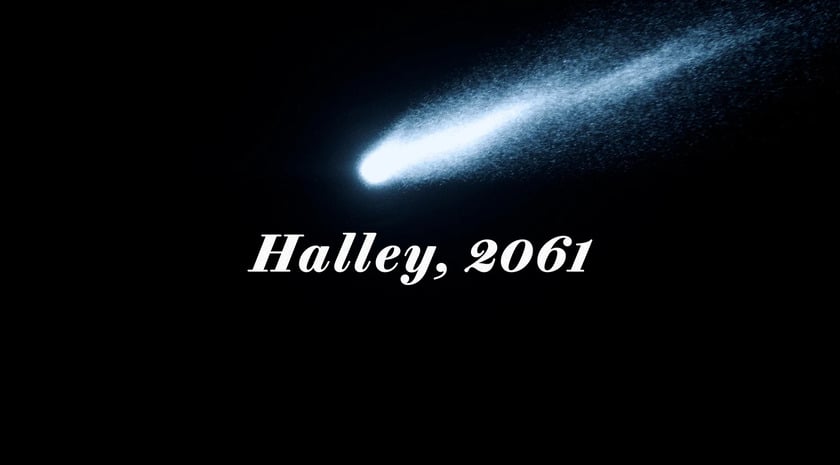 A white comet falling with the words "Halley, 2061" written near it