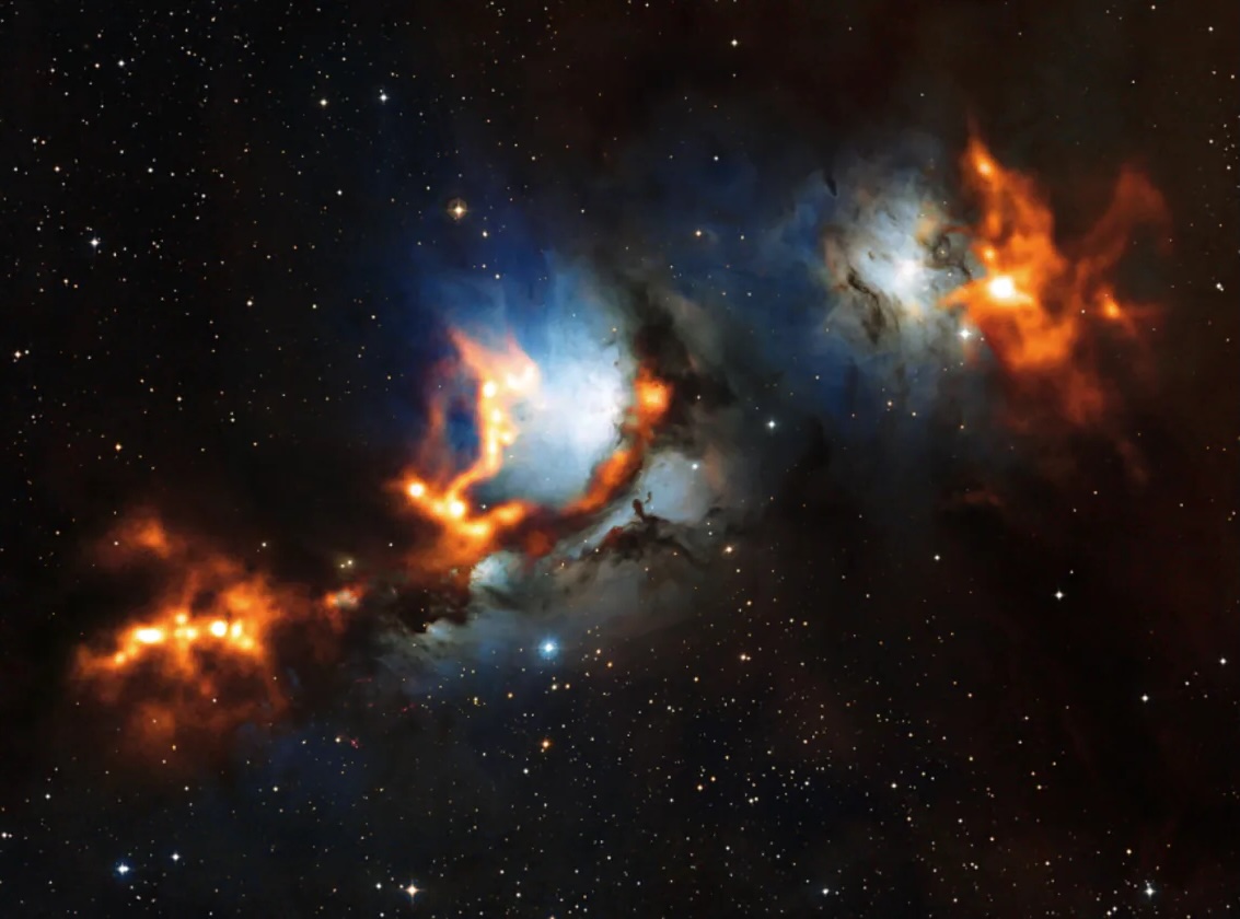 Blue and red light illuminating from the Orion constellation in the black universe.