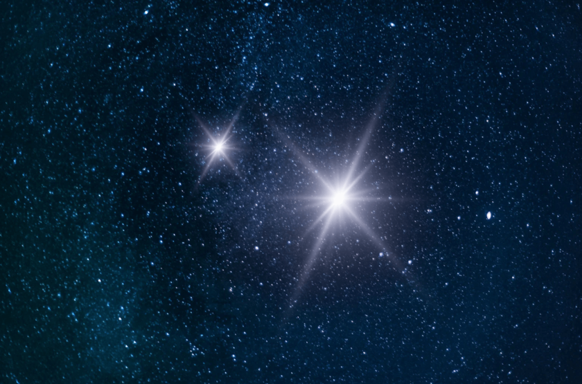 Two white bright stars shining in the night sky