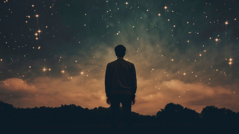 Man watching the night sky