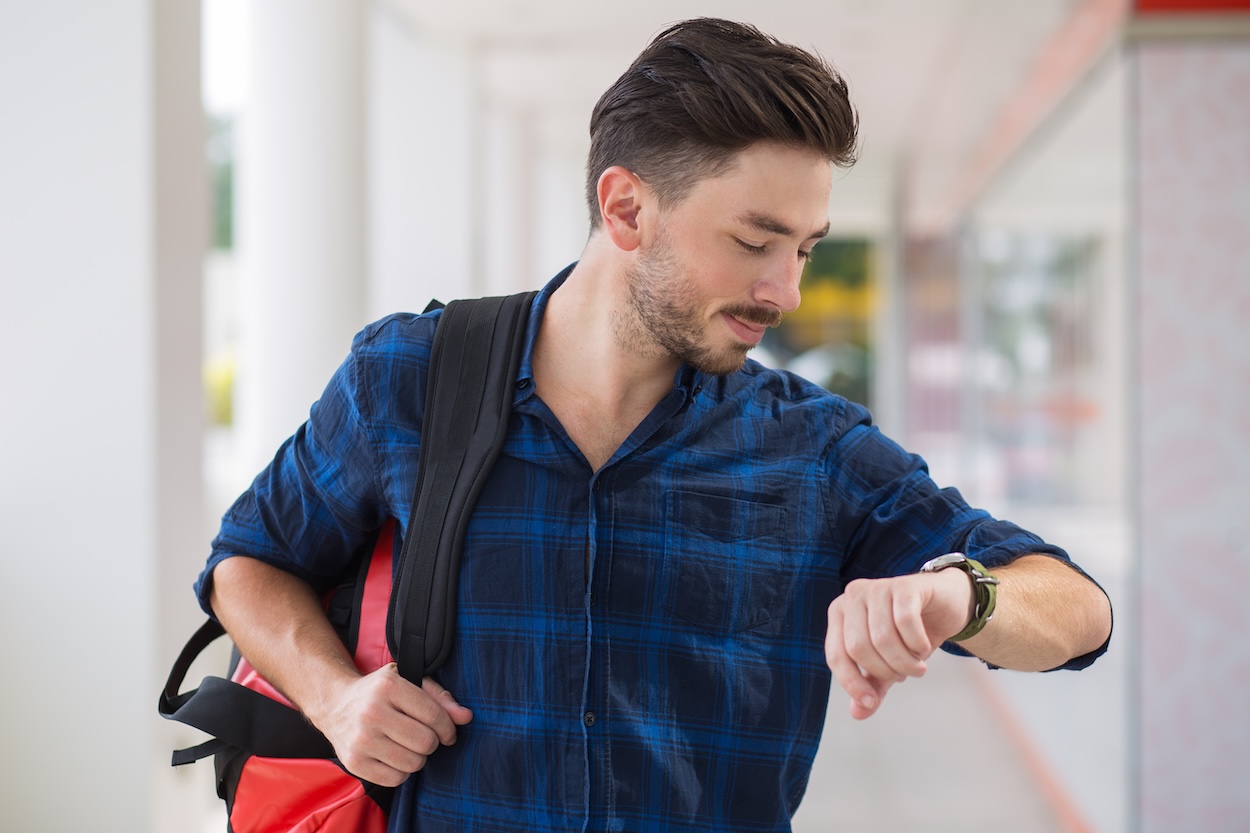 A man checking his watch.